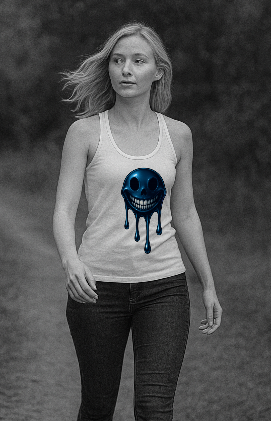 Woman wearing a white tank top with a blue skull design against a dark background